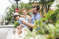 Happy familly of five in the park