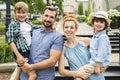 Happy familly of four in the park