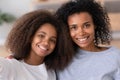 Happy family african american mum and teen daughter taking selfie Royalty Free Stock Photo