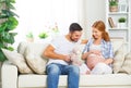 Happy family in anticipation of the birth of baby. Pregnant woma Royalty Free Stock Photo