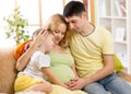 Happy family in anticipation of birth of new baby Royalty Free Stock Photo