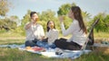 Happy family asian and little girl are drinking orange juice and have enjoyed ourselves together