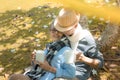 Happy family asian senior couple drinking coffee in park retirement smile in nature park Royalty Free Stock Photo