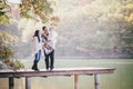 Happy family in an autumn forest Royalty Free Stock Photo