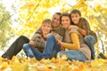 Happy family in autumn forest Royalty Free Stock Photo