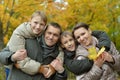 Happy family in autumn forest Royalty Free Stock Photo