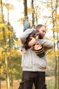 Happy family in autumn park Royalty Free Stock Photo
