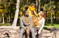 Happy family in autumn park. African American family: black father, mom and child boy on nature in fall. Royalty Free Stock Photo