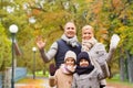 Happy family in autumn park Royalty Free Stock Photo