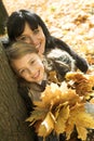 Happy family in an autumnal park