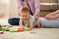 Happy family with baby boy playing at home Royalty Free Stock Photo