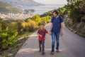 Happy family on the background of Panoramic view of the city of Budva, Montenegro. Beautiful view from the mountains to Royalty Free Stock Photo