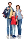 Happy family with backpacks pointing finger to you