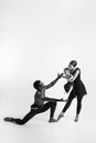 A happy family of ballet dancers on white studio background Royalty Free Stock Photo