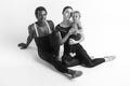 A happy family of ballet dancers on white studio background Royalty Free Stock Photo