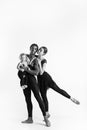 A happy family of ballet dancers on white studio background Royalty Free Stock Photo