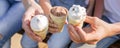 Happy family banner. Ice cream in women`s and children`s hands. Happy family hands Royalty Free Stock Photo