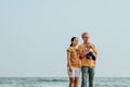 Happy family on the beach.  Father, mother and baby having fun on summer vacation. Holiday travel concept Royalty Free Stock Photo