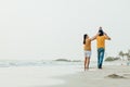 Happy family on the beach.  Father, mother and baby having fun on summer vacation. Holiday travel concept Royalty Free Stock Photo