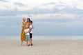 Happy family on beach. Mom and three children having fun on the sea. Family lifestyle Royalty Free Stock Photo