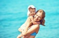 Happy family on the beach. mother and baby daughter Royalty Free Stock Photo