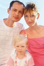 Happy family on beach, Steadfastly looking Royalty Free Stock Photo