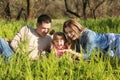 Happy family blowing soap bubbles in park Royalty Free Stock Photo