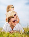 Happy family with blue sky and green grass Royalty Free Stock Photo