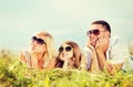 Happy family with blue sky and green grass Royalty Free Stock Photo