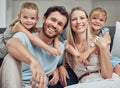 Happy family, bonding parents or children hug in Canada house or home living room in trust, relax support or love Royalty Free Stock Photo