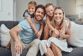 Happy family, bonding parents or children hug in Canada house or home living room in trust, relax support or love Royalty Free Stock Photo