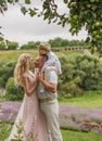 Family with boy relax in lavender field