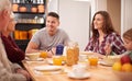 Happy family, breakfast and eating together in home for bonding with mother and father in the morning. Food, parents and Royalty Free Stock Photo