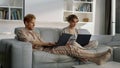 Happy family browsing web together closeup. Freelancers couple working home Royalty Free Stock Photo