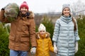 Happy family buying christmas tree at market Royalty Free Stock Photo