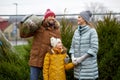 Happy family buying christmas tree at market Royalty Free Stock Photo