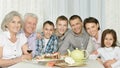 Happy family with cake