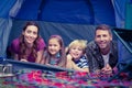 Happy family camping in the park Royalty Free Stock Photo