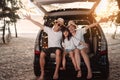 Happy Family with car travel and camping road trip. summer vacation in car in the sunset, Dad, mom and daughter happy traveling Royalty Free Stock Photo