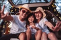 Happy Family with car travel and camping road trip. summer vacation in car in the sunset, Dad, mom and daughter happy traveling Royalty Free Stock Photo