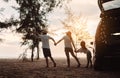 Happy Family with car travel and camping road trip. summer vacation in car in the sunset, Dad, mom and daughter happy traveling Royalty Free Stock Photo