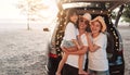 Happy Family with car travel and camping road trip. summer vacation in car in the sunset, Dad, mom and daughter happy traveling Royalty Free Stock Photo