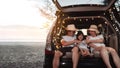Happy Family with car travel and camping road trip. summer vacation in car in the sunset, Dad, mom and daughter happy traveling Royalty Free Stock Photo