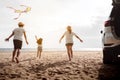 Happy Family with car travel road trip. summer vacation in car in the sunset, Dad, mom and daughter happy traveling enjoy together Royalty Free Stock Photo