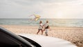 Happy Family with car travel road trip. summer vacation in car in the sunset, Dad, mom and daughter happy traveling enjoy together Royalty Free Stock Photo