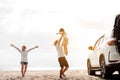 Happy Family with car travel road trip. summer vacation in car in the sunset, Dad, mom and daughter happy traveling enjoy together Royalty Free Stock Photo
