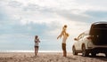 Happy Family with car travel road trip. summer vacation in car in the sunset, Dad, mom and daughter happy traveling enjoy together Royalty Free Stock Photo