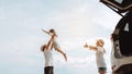 Happy Family with car travel road trip. summer vacation in car in the sunset, Dad, mom and daughter happy traveling enjoy together Royalty Free Stock Photo