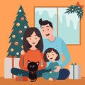 Happy family celebrating Christmas. Christmas tree, gift box presents, black cat with bow. Parents sitting with girl daughter kid