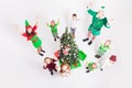 Happy family celebrating Christmas near Cristmas tree. Royalty Free Stock Photo